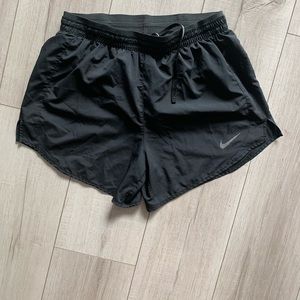 5 in black Nike shorts